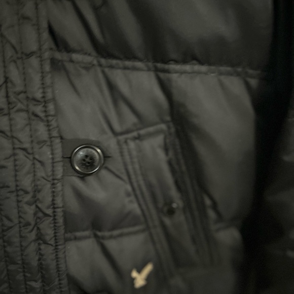 Y2K American Eagle black puffer bomber jacket with a faux fur-trimmed hood. - Picture 2 of 5